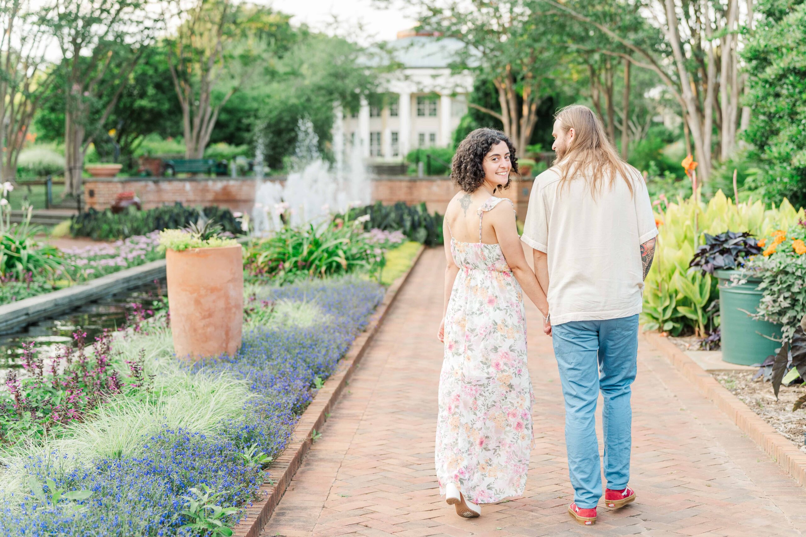 Romantic portrait by the reflecting pools in the Canal Garden at Daniel Stowe Conservancy