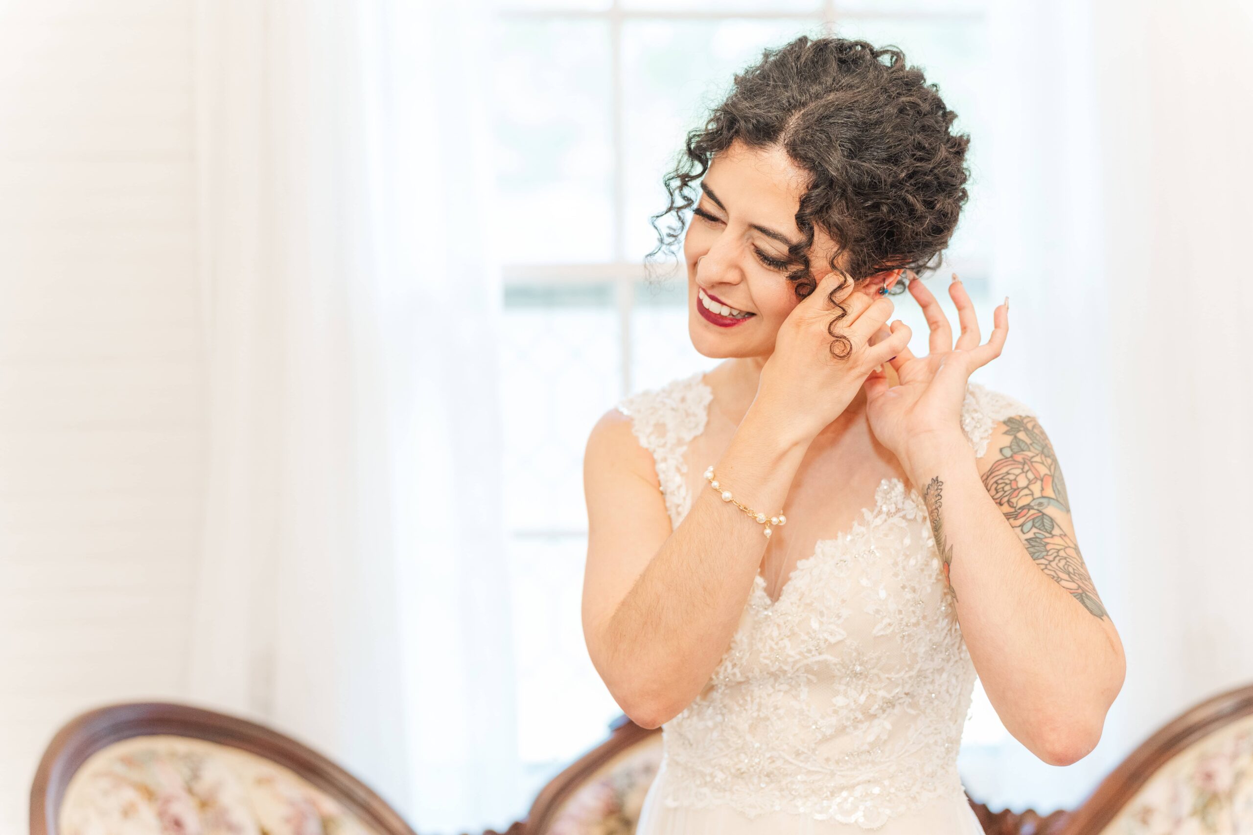 Bride getting ready in the bridal suite at Mariposa Chapel