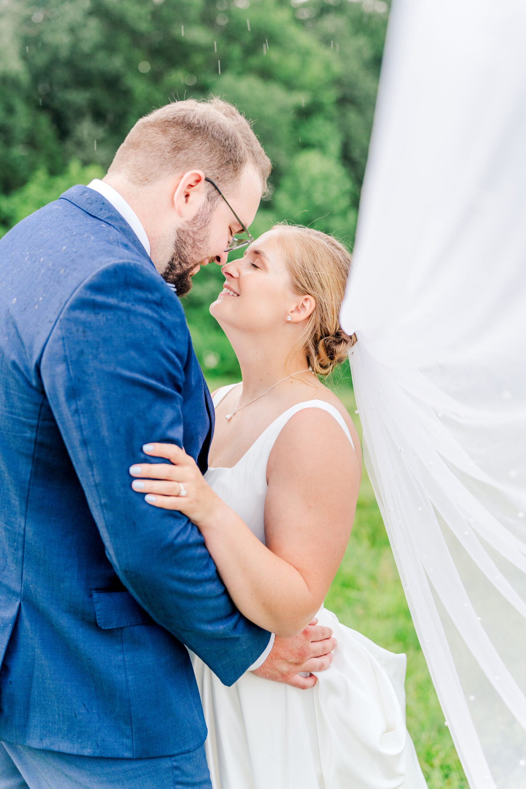 rainy wedding portraits at the fields at skycrest