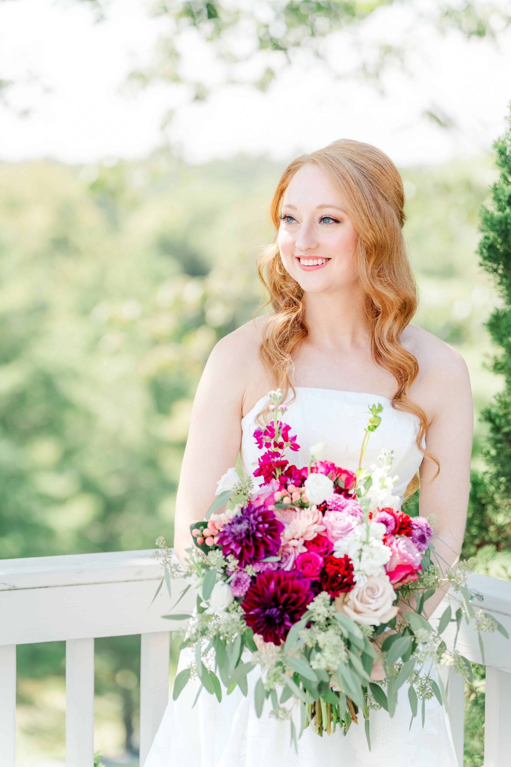 Bride smiling during Olde Beau Resort & Golf Club wedding photography session