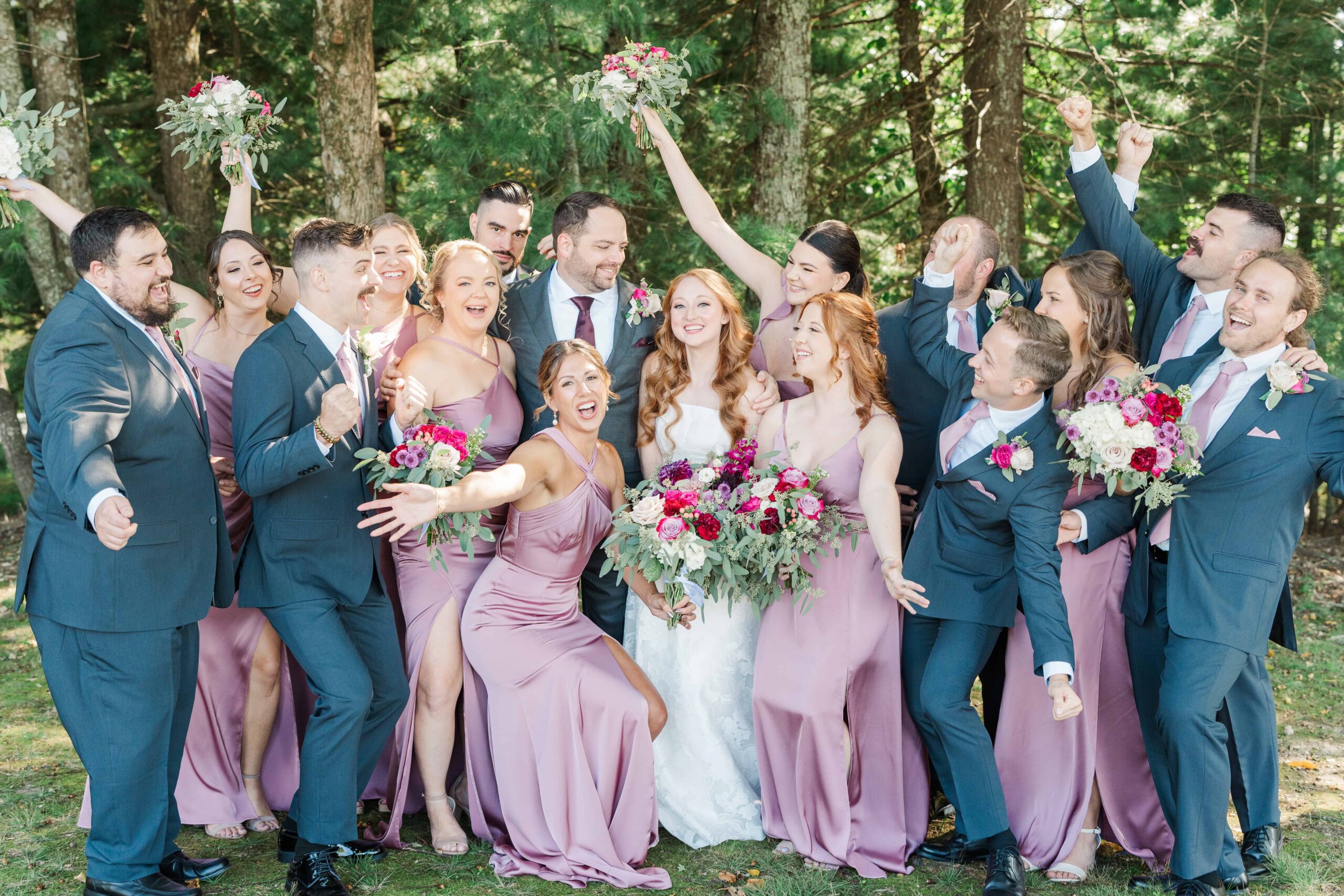 Bridesmaids and groomsmen laughing during Olde Beau Resort & Golf Club wedding photography