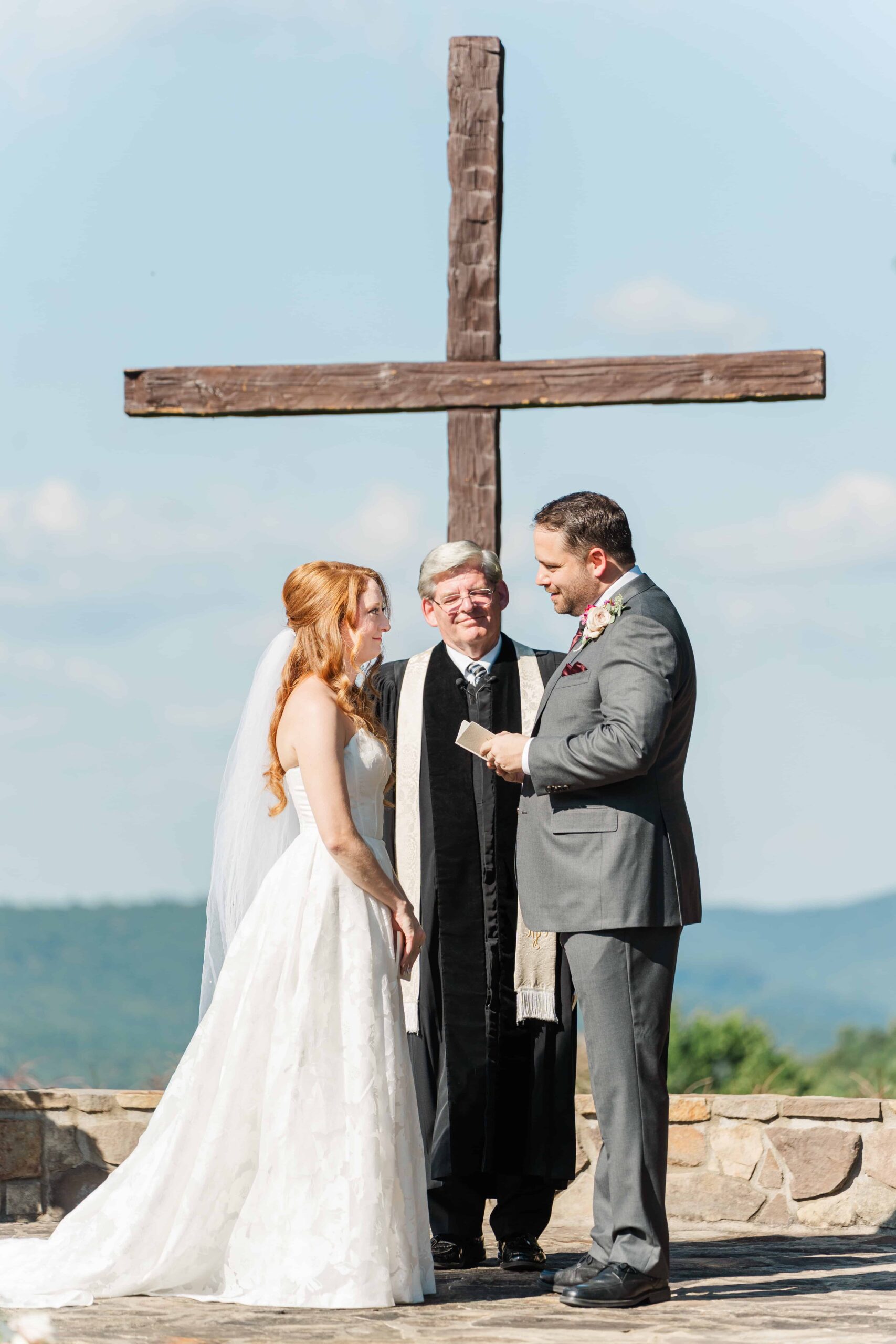 Caroline and Derek exchanging vows in Roaring Gap North Carolina
