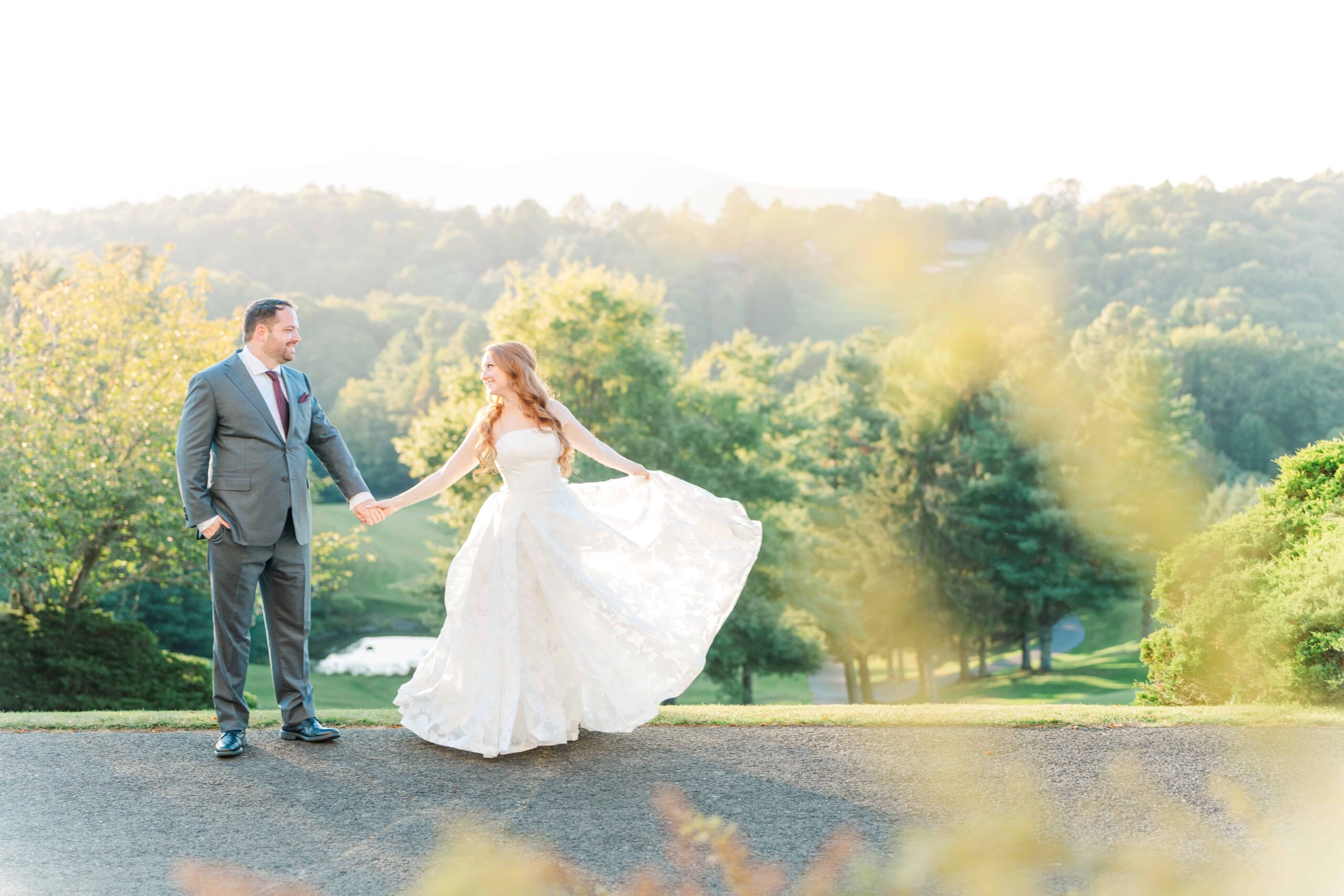 Sunset wedding portraits with red sky over Blue Ridge Parkway