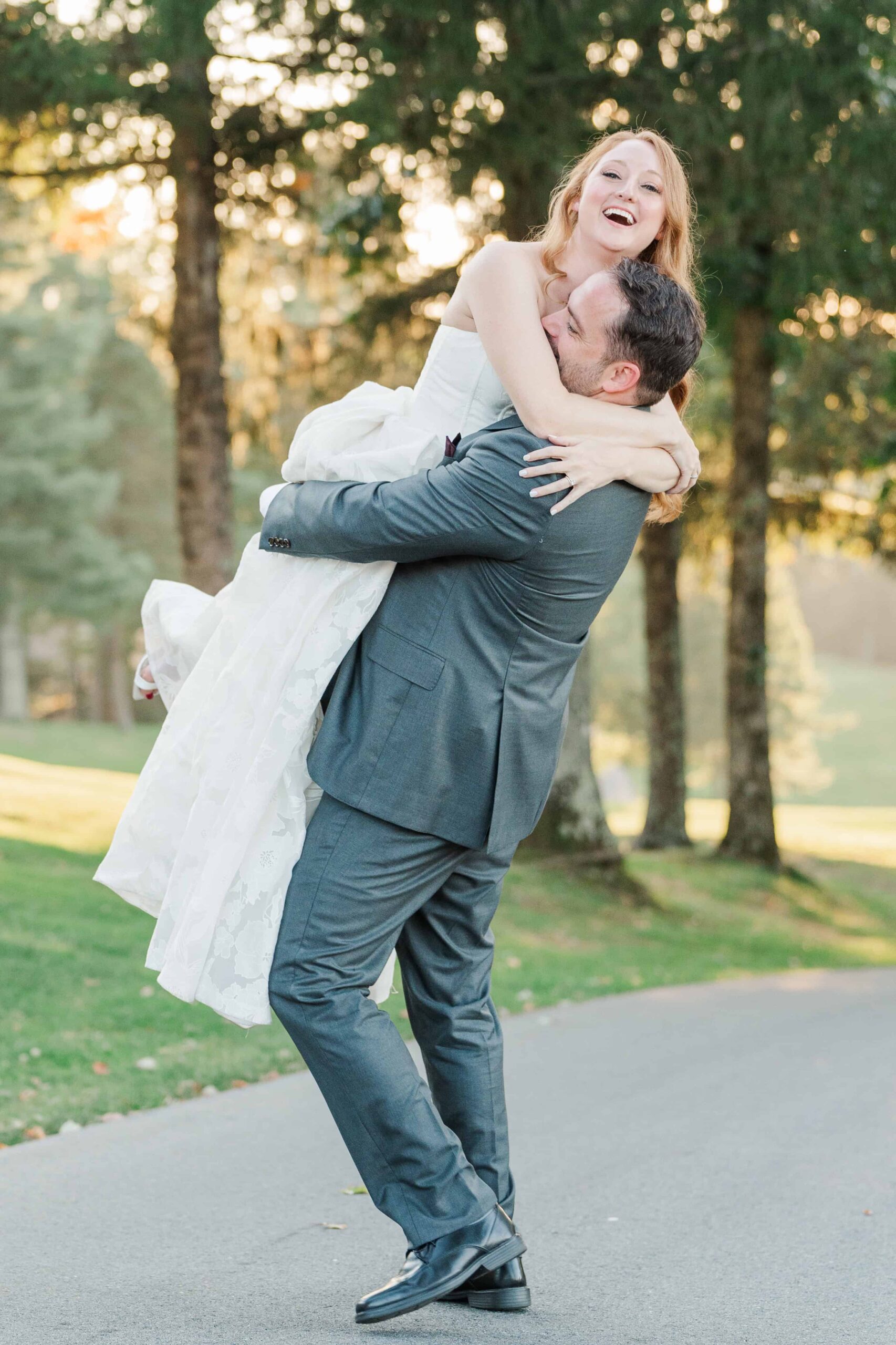 Bride and groom laughing during golden hour photos at Olde Beau Resort and Golf Club