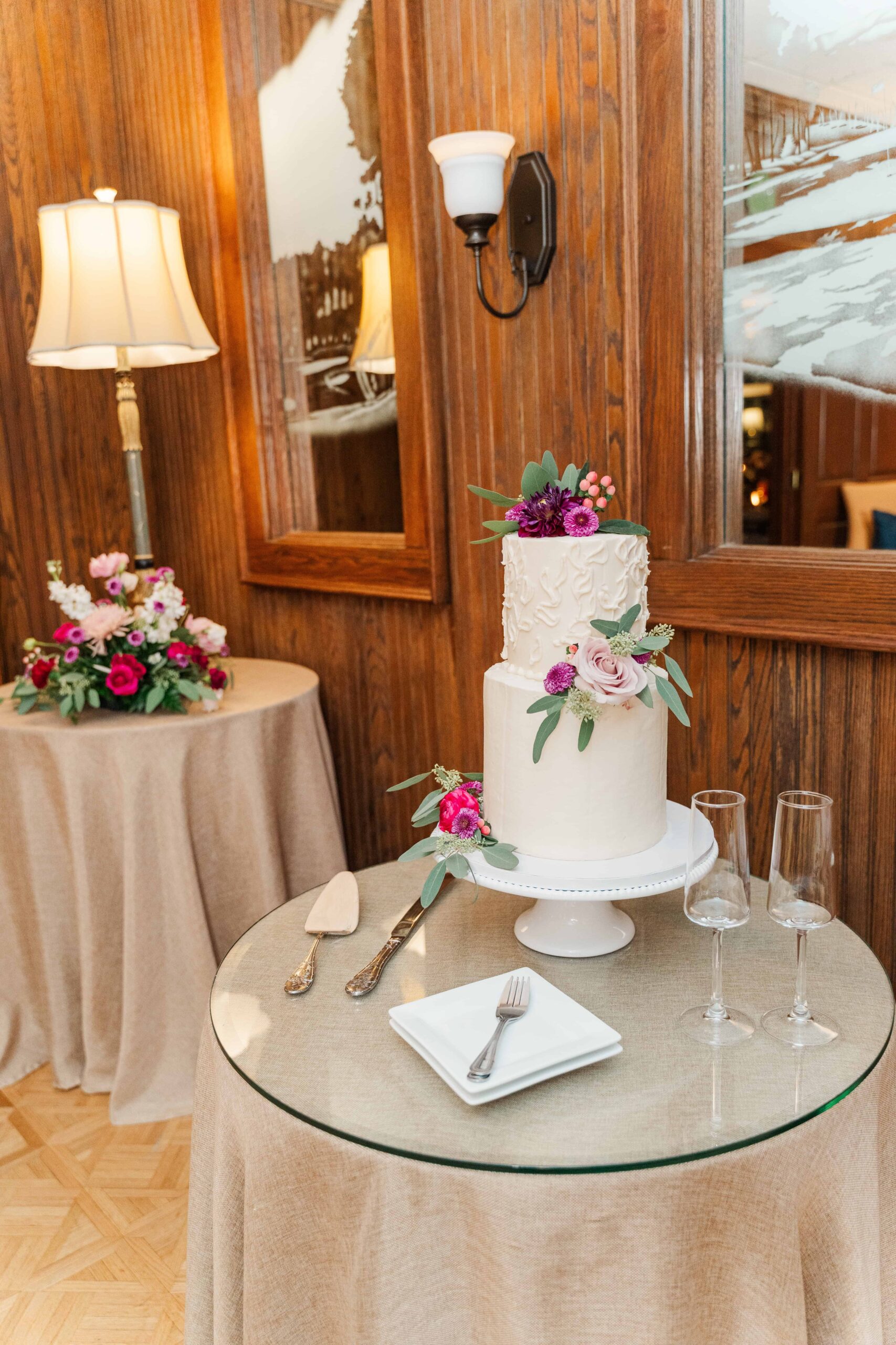 Elegant wedding cake displayed at grand reception
