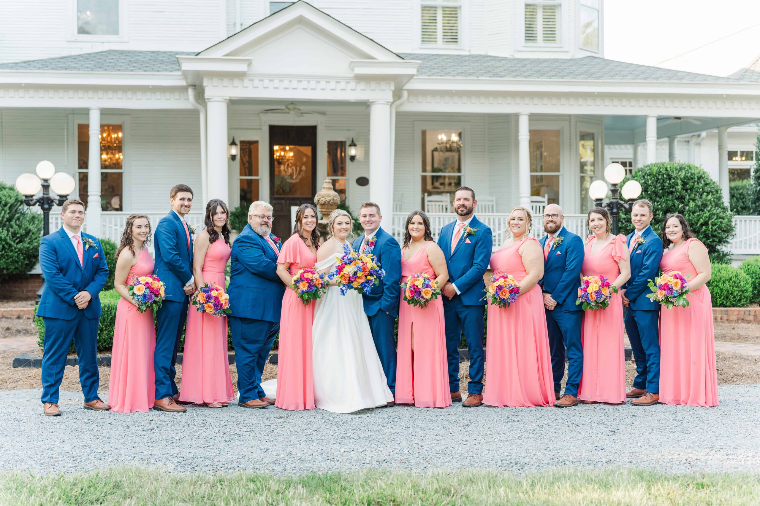 Bridal party portraits at The Grande Victorian showing plenty of open space and elegant details