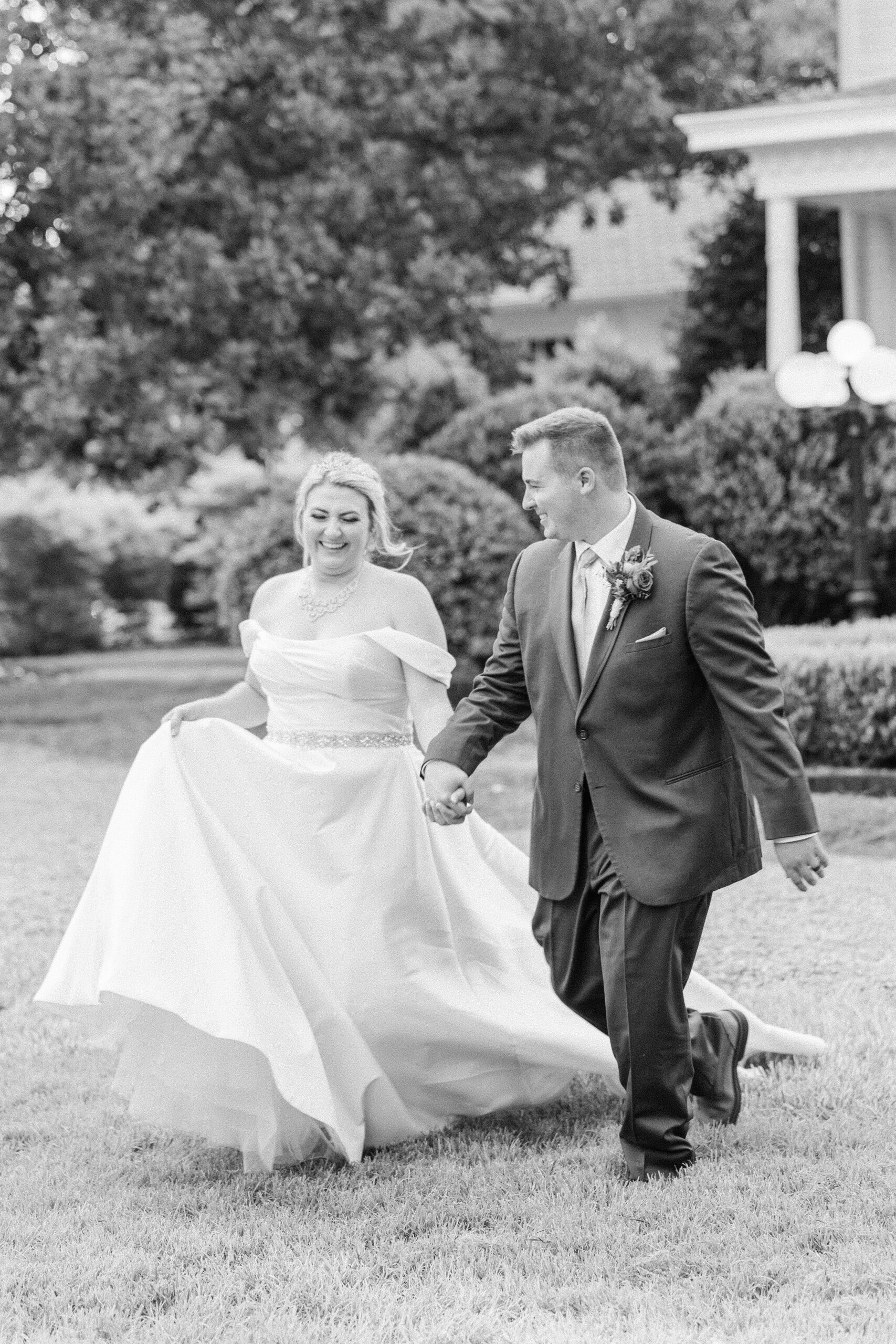 Evening portraits of bride and groom at the gazebo under twinkle lights at The Grande Victorian