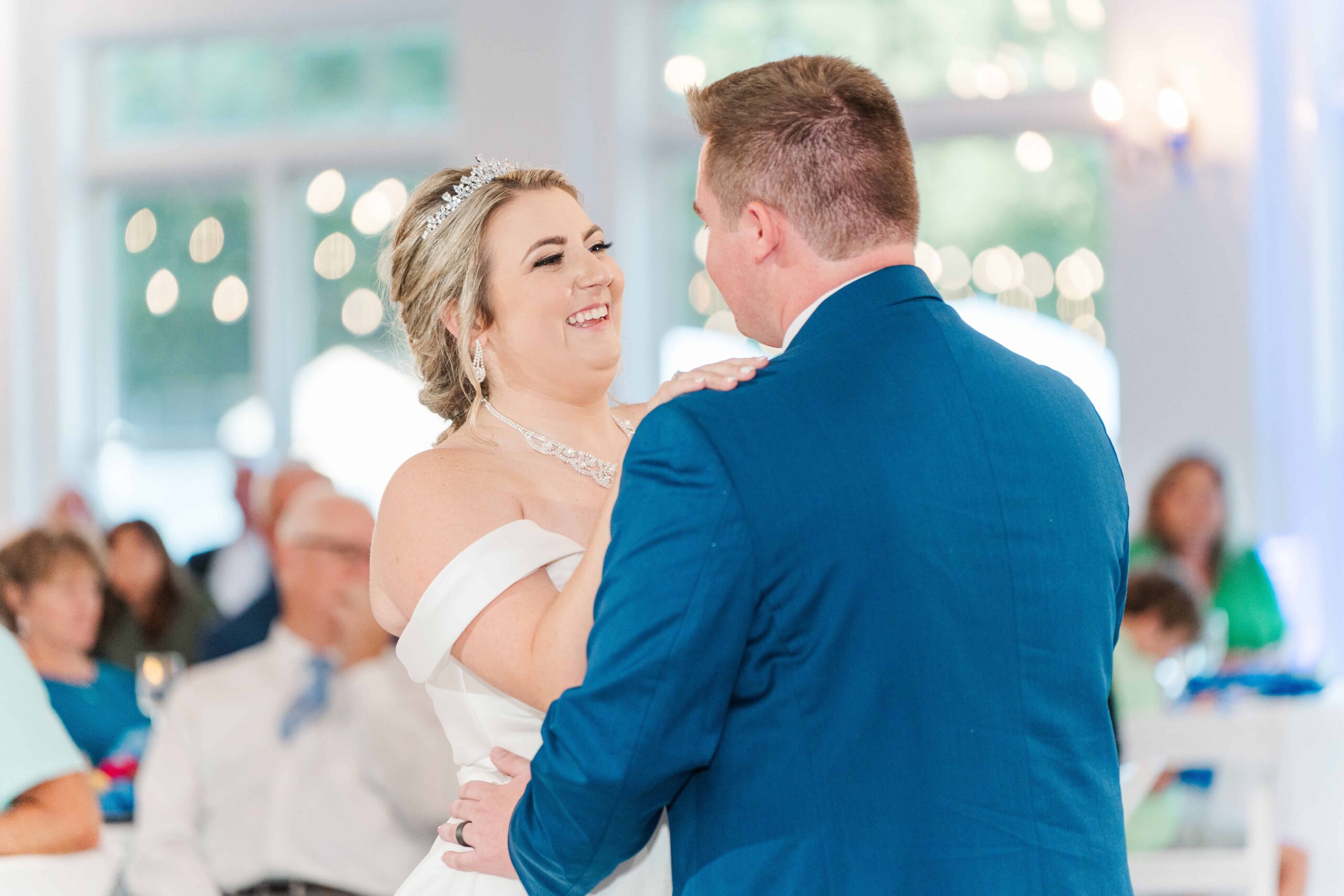 Couple dancing in the event space at The Grande Victorian surrounded by southern hospitality