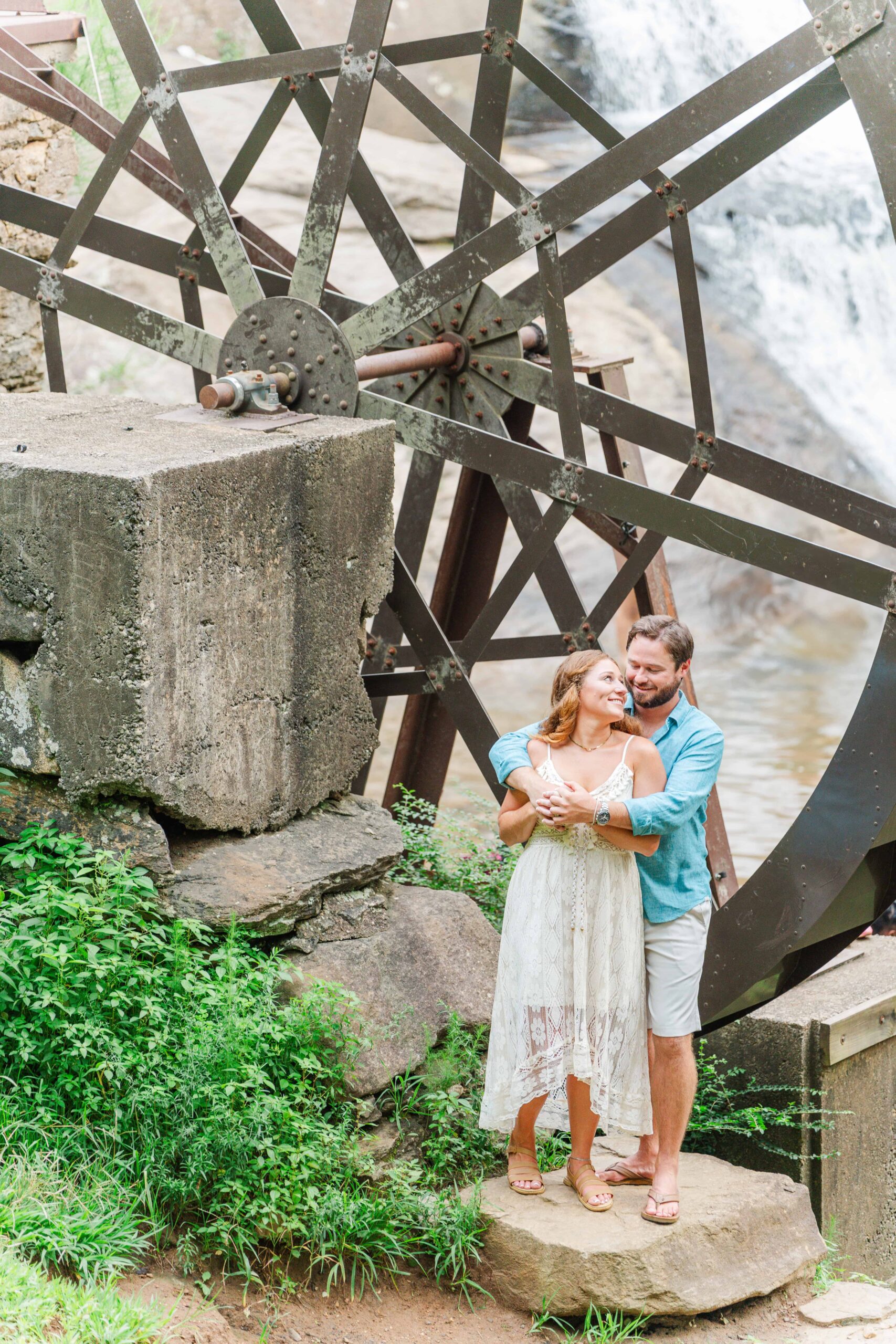 Historic old mill at McGalliard Falls engagement photo location