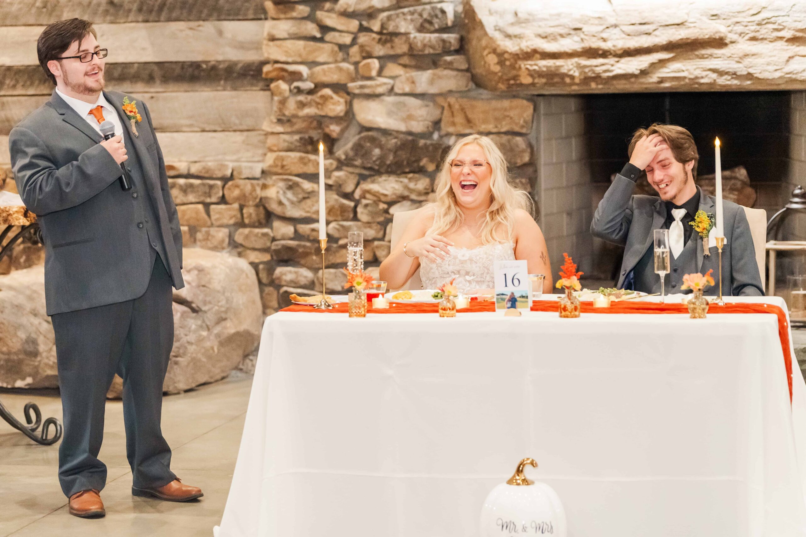 Groom smiling during the speeches in the Boulder Room