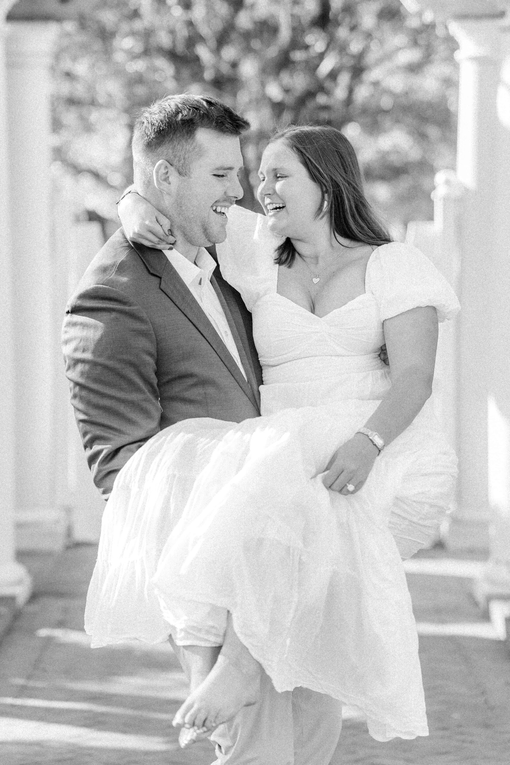 Sweet moment during Charlotte garden engagement photo session