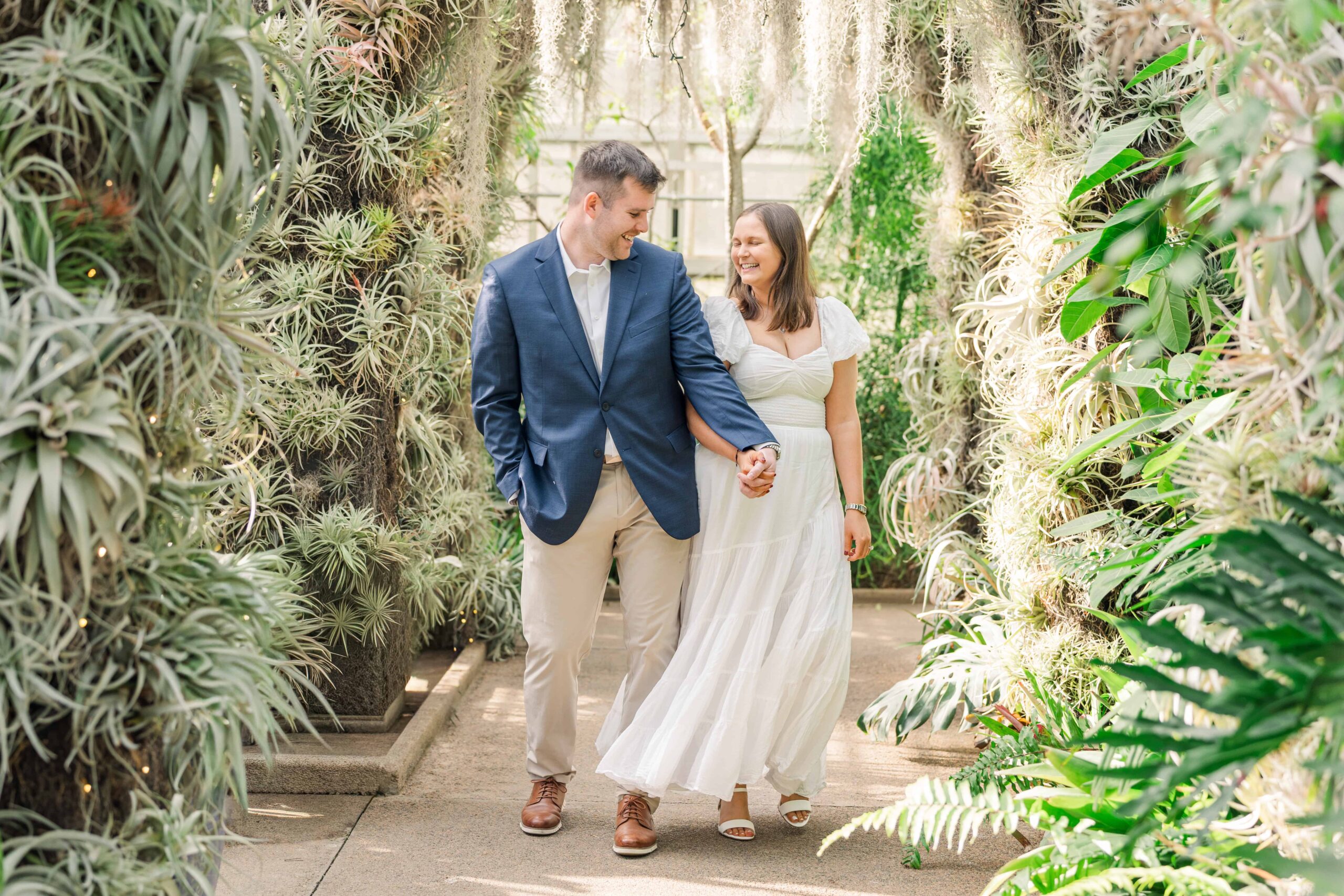 Orchid conservatory engagement photos at Daniel Stowe Botanical Gardens