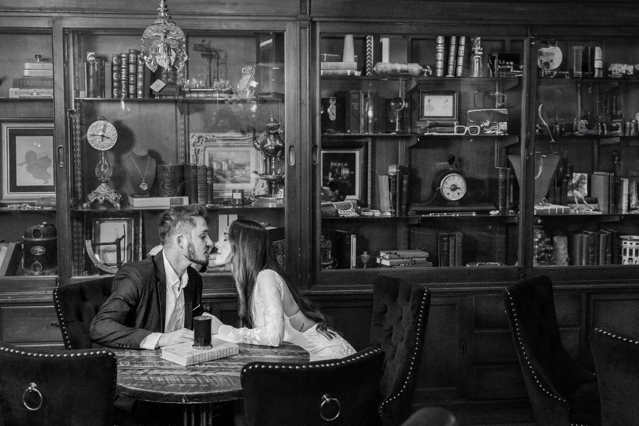 The Ivey’s Hotel photos in the library lounge during engagement session