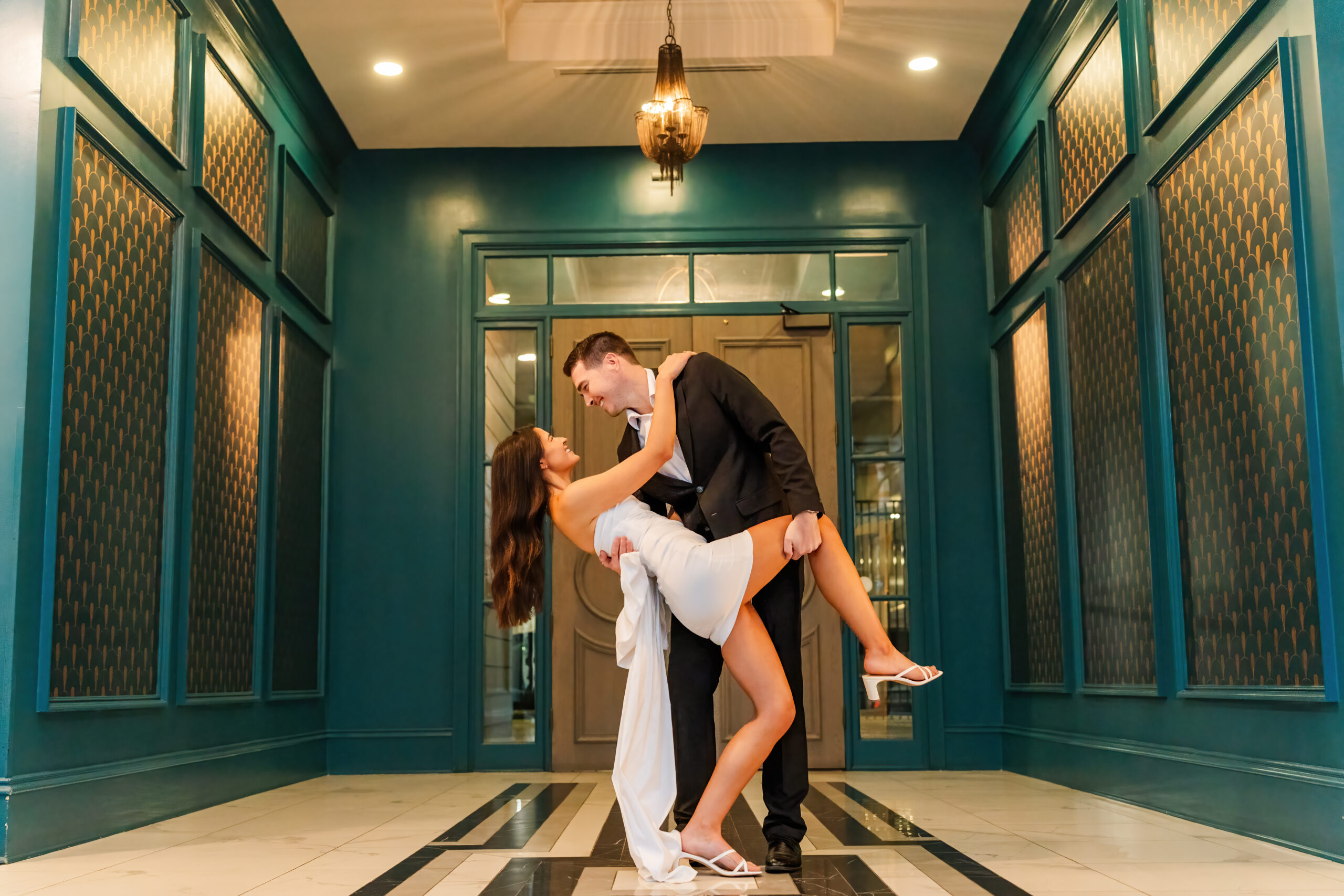 Couple dips during their charlotte engagement session