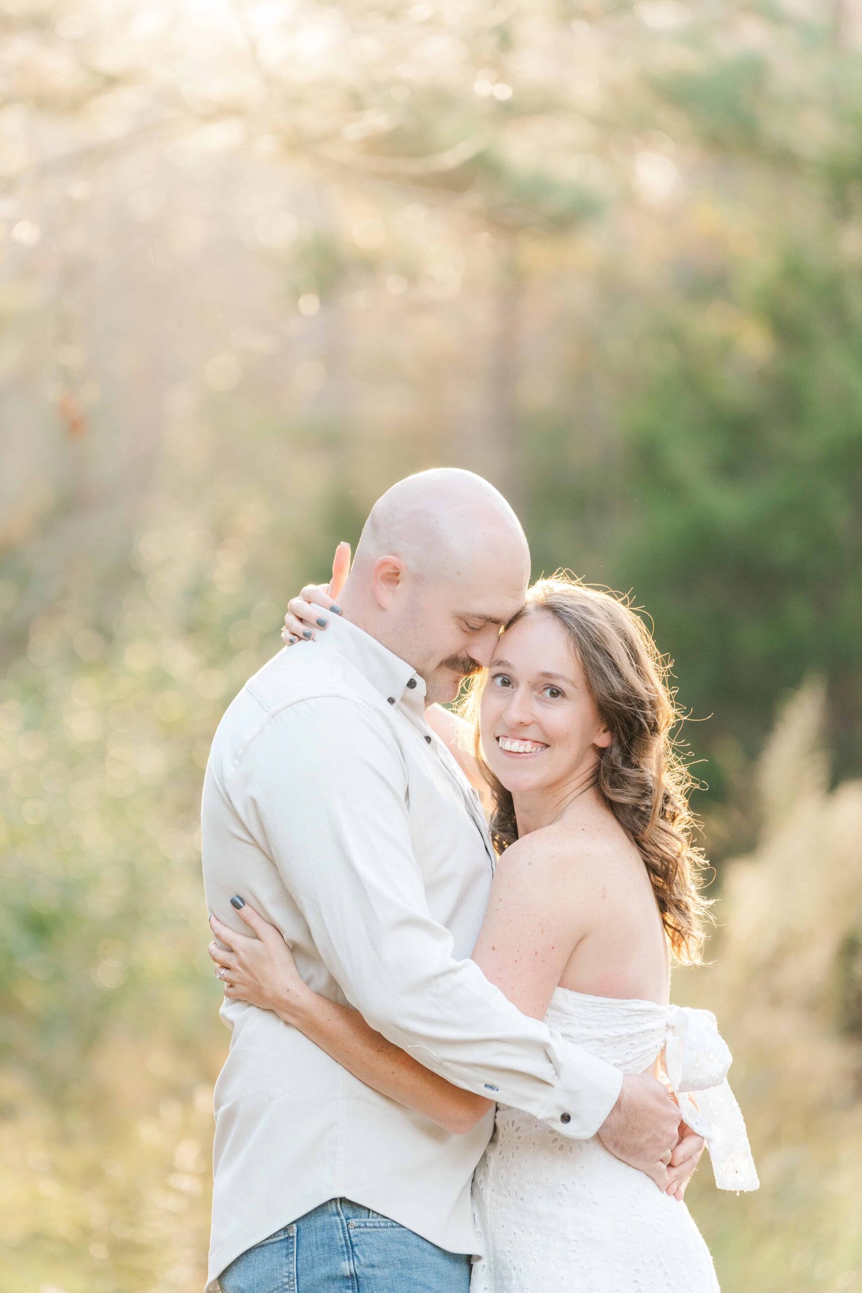 Engagement session in Charlotte area with open space and soft evening light