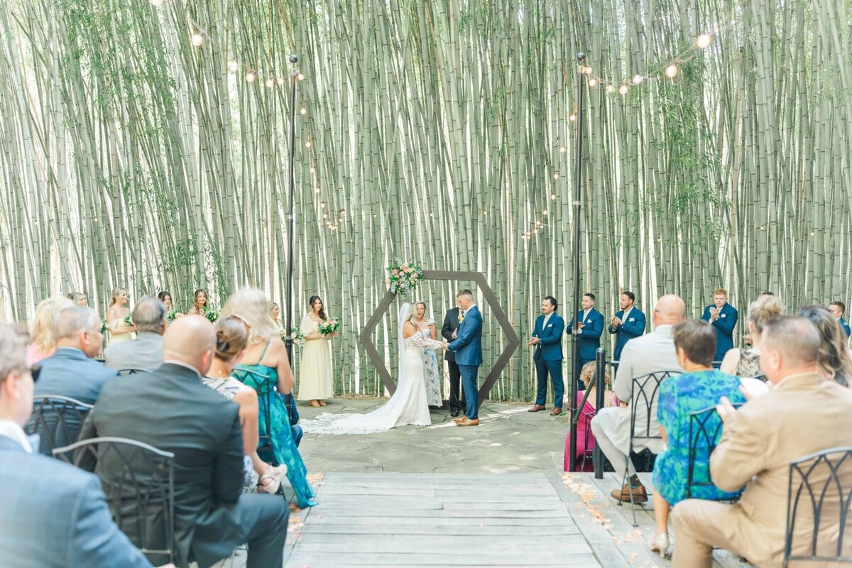 Camelot Meadows Wedding ceremony in the bamboo garden in Belmont NC