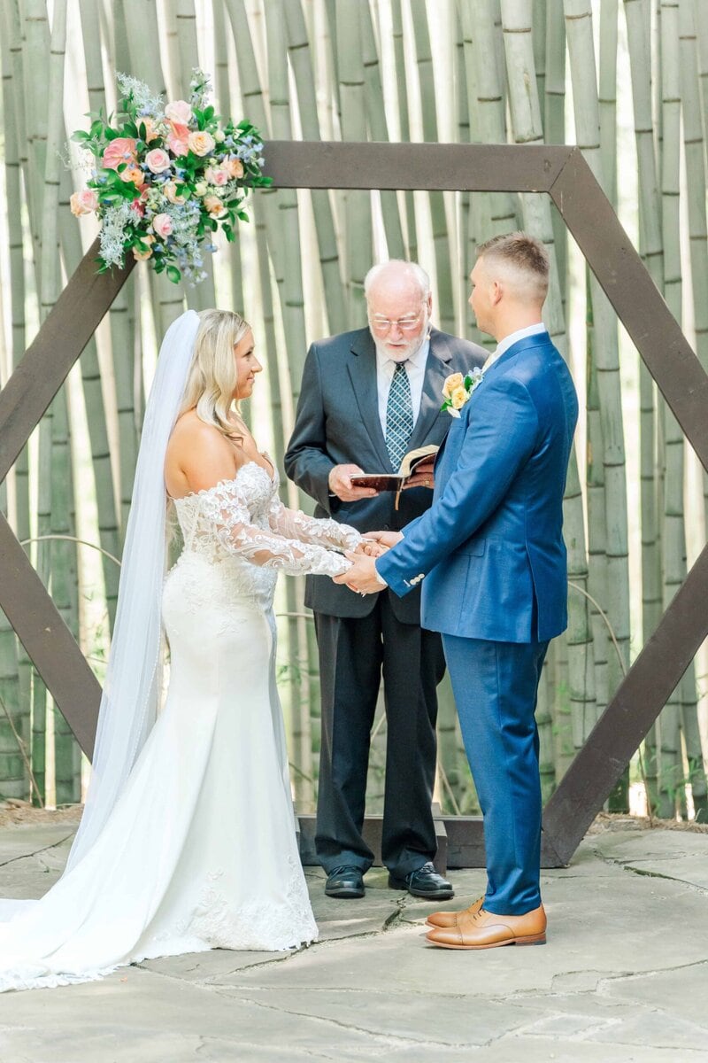 Bride and groom during their Camelot Meadows Wedding ceremony
