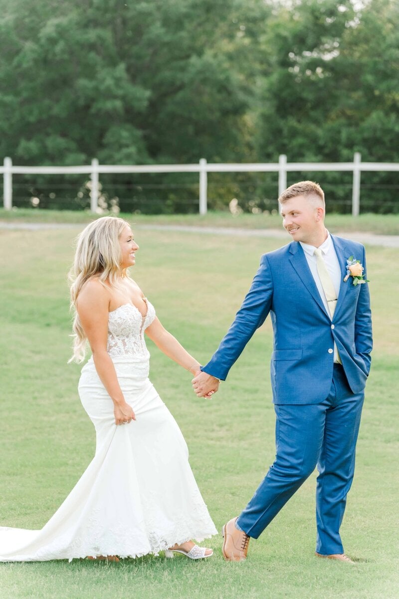 Romantic Camelot Meadows Wedding photos in the open pasture