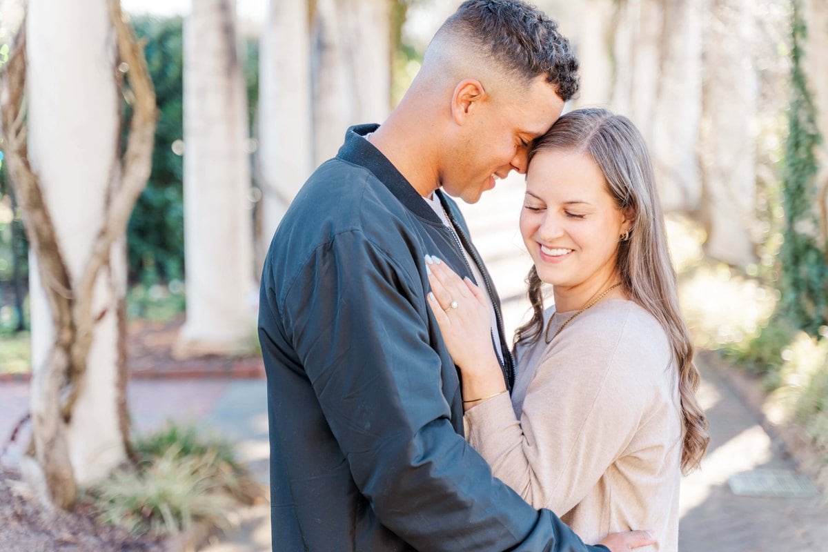 Candid engagement photos at Daniel Stowe Conservancy