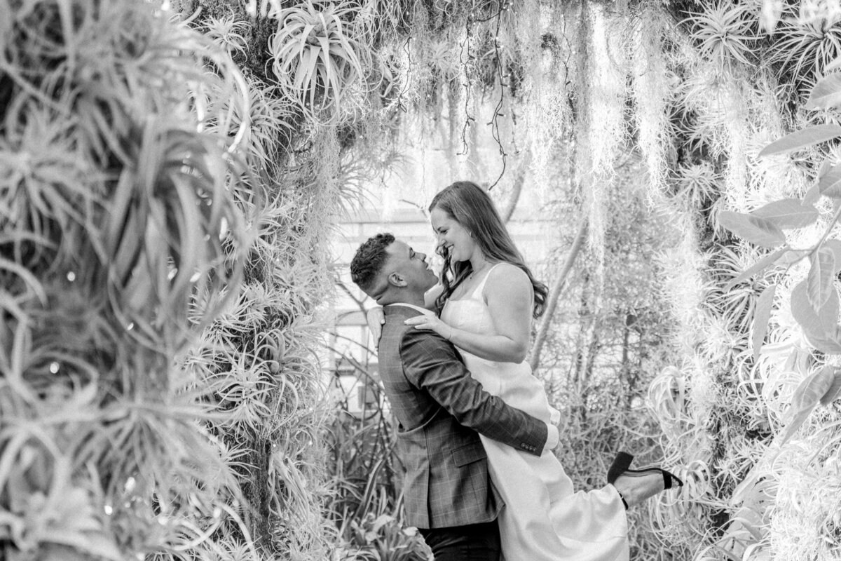 Greenhouse winter engagement photos at Daniel Stowe