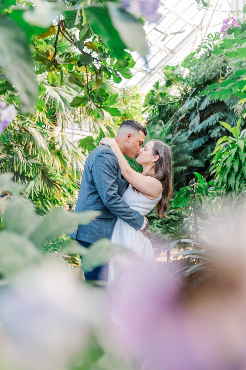 Romantic engagement photos outside the Orchid Conservatory