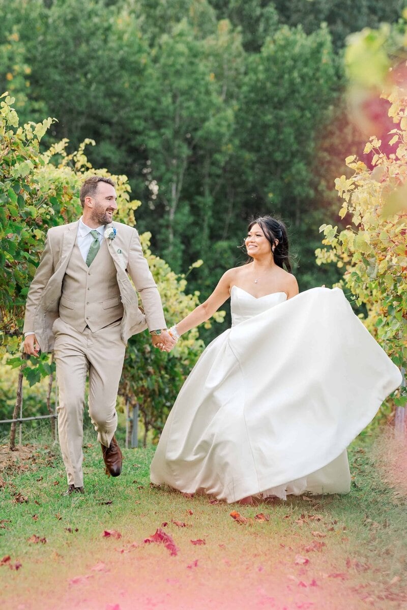 Joyful couple photos at Dugaren Vineyards Wedding venue